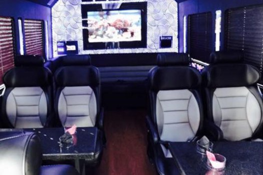 Party bus interior with a TV